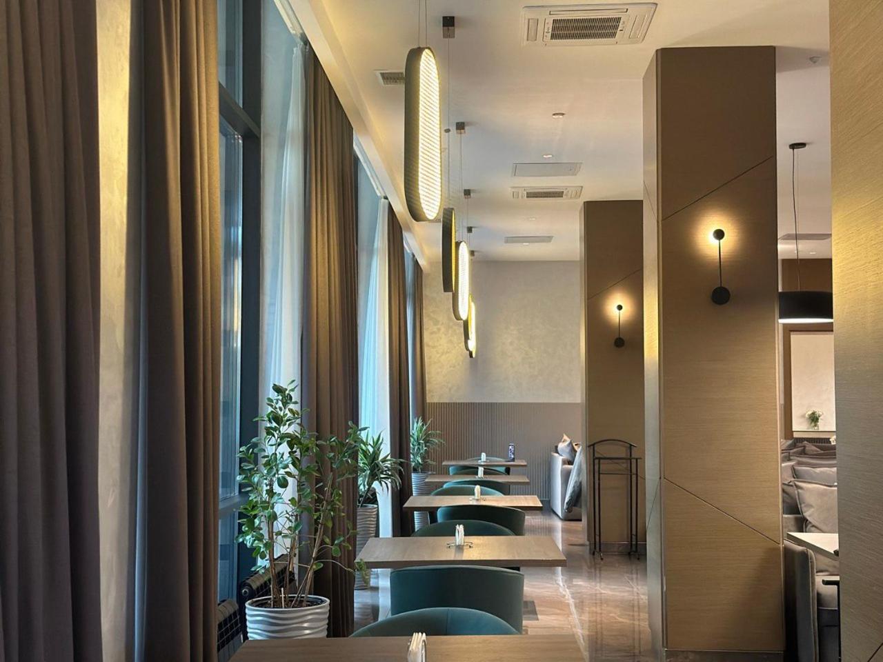 Raavah Aparthotel Алма Ата Екстериор снимка